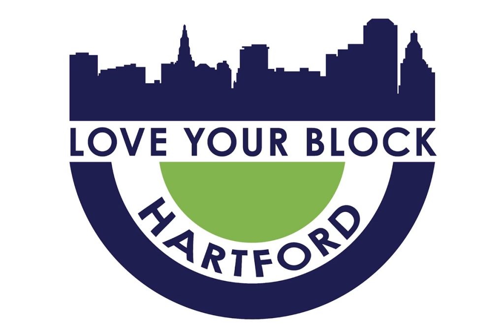 This image is a logo for Love Your Block Hartford. It features a dark blue city skyline silhouette above the words “LOVE YOUR BLOCK” in bold blue text. Below that, a green semicircle and the word “HARTFORD” complete the circular emblem.